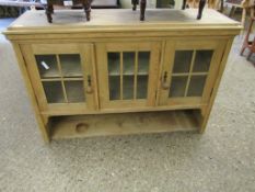 PINE FRAMED WALL MOUNTED CUPBOARD WITH THREE GLAZED DOORS WITH OPEN SHELF