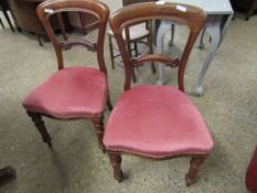 PAIR OF VICTORIAN BALLOON BACK DINING CHAIRS WITH PINK UPHOLSTERY AND TURNED FRONT LEGS