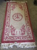 GOOD QUALITY MODERN CHINESE FLOOR RUG, DECORATED IN CREAM AND PINK WITH FLORAL DETAIL