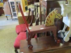 MID-20TH CENTURY TIN PLATE AND WOOD CHILD’S RIDE ALONG HORSE TOY