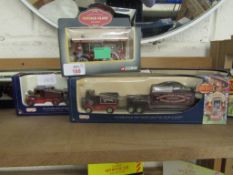 FOUR BOXED VARIOUS LLEDO SHOWMAN’S SERIES FUN FAIR DIE-CAST LORRIES TOGETHER WITH A CORGI VINTAGE