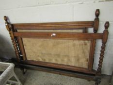 OAK FRAMED DOUBLE BED WITH BARLEY TWIST SUPPORTS AND CANE PANELLED BACK AND FOOT BOARD