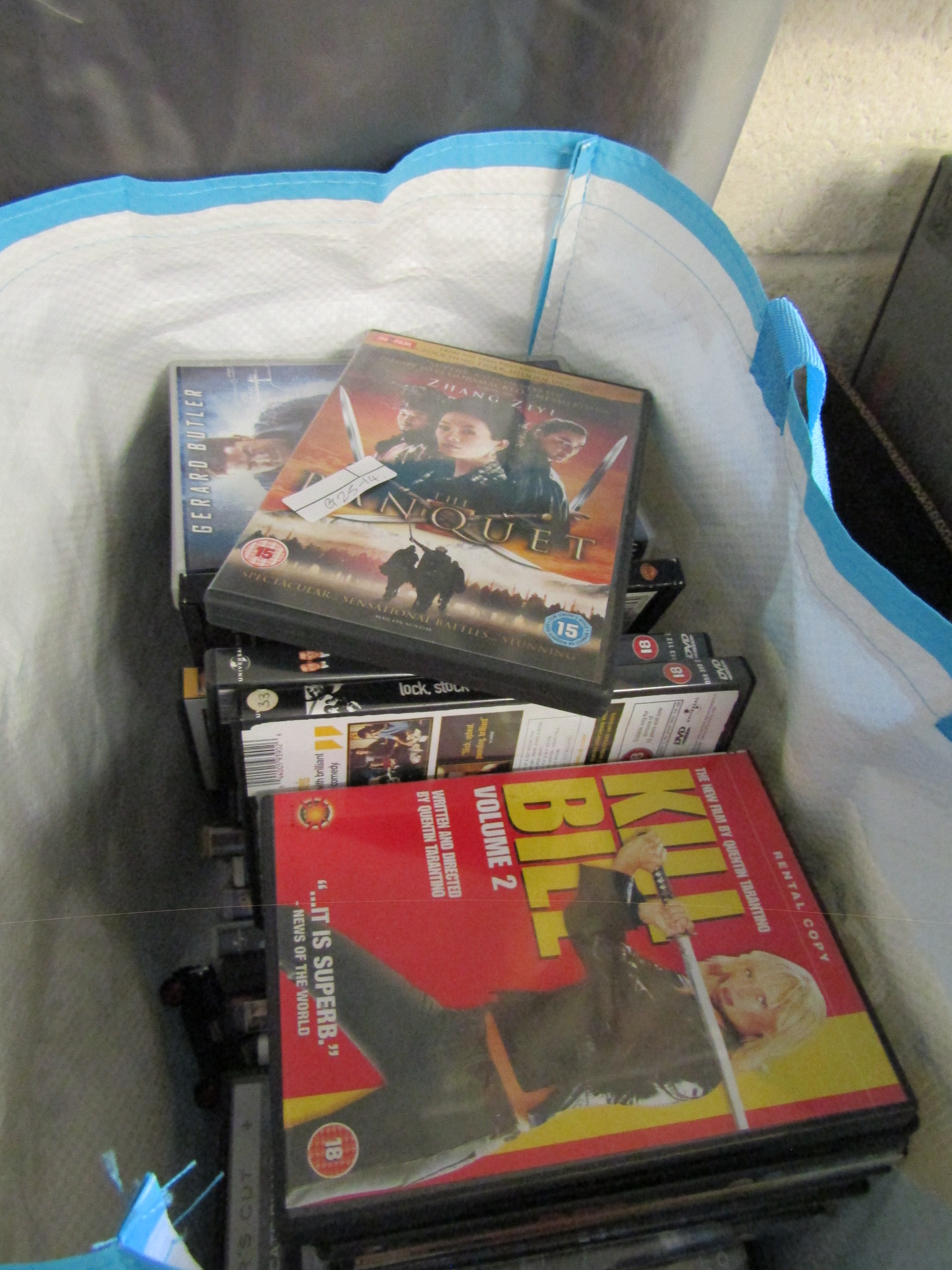 BAG OF MIXED DVDS ETC