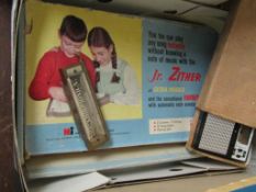 JUNIOR ZITHER HARMONICA AND A STYLOPHONE