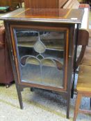 EDWARDIAN MAHOGANY AND SATINWOOD INLAID DISPLAY CABINET WITH LEADED AND GLAZED DOORS ON TAPERING