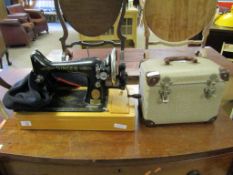 SINGER SEWING MACHINE TOGETHER WITH A FURTHER HAND OPERATED SEWING MACHINE IN CASE (2)