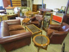GOOD QUALITY BROWN LEATHER HARLEQUIN THREE-PIECE SUITE COMPRISING TWO CLUB CHAIRS WITH BUTTON FRONTS
