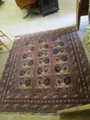 GOOD QUALITY BOKHARA CARPET WITH BROWN GROUND AND REPEATING LOZENGE CENTRE WITH MULTI-GULL BORDER