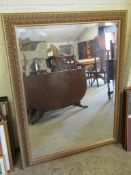 LARGE REPRODUCTION GILT FRAMED WALL MIRROR WITH BEVELLED GLASS