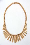 A 9ct gold "Cleopatra" style fringe necklace, gross weight 27gms