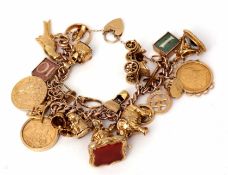 A 9ct gold curb link bracelet suspending two 9ct gold framed Victorian sovereigns dated 1891 and