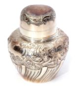 Victorian tea canister of inverted baluster form with pull off cover and with embossed floral and