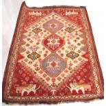 Late 20th century Caucasian rug, multi-gull border, the corners decorated with animal motifs,