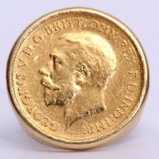 George V half sovereign, dated 1914, framed in an 18c stamped ring mount, 9.6gms gross weight,