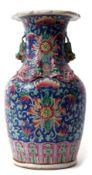 19th century Chinese porcelain vase, the blue ground with enamelled decoration of flowers and