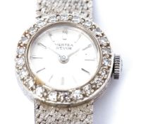 Third quarter of 20th century 9ct gold and diamond set ladies cocktail watch, Vertex "Revue", the