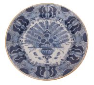 Delft charger with blue and white porcelain style design within a yellow rim