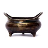 Chinese bronze censer with loop handles standing on three stud feet, impressed reign mark to base,