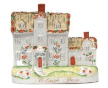 Staffordshire model of a house with the title "Potash Farm" in gilt to base (Potash Farm was the