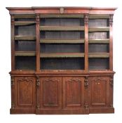 Victorian rosewood library bookcase of small proportions, moulded cornice over a central break