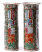 Pair of Cantonese cylindrical vases with typical enamelled decoration of alternating panels of