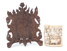 Asian ivory panel with wooden frame, carved with a figures on a cart, pulled by oxen