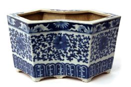 Chinese porcelain planter of serpentine shape decorated in blue and white "Ming" style with