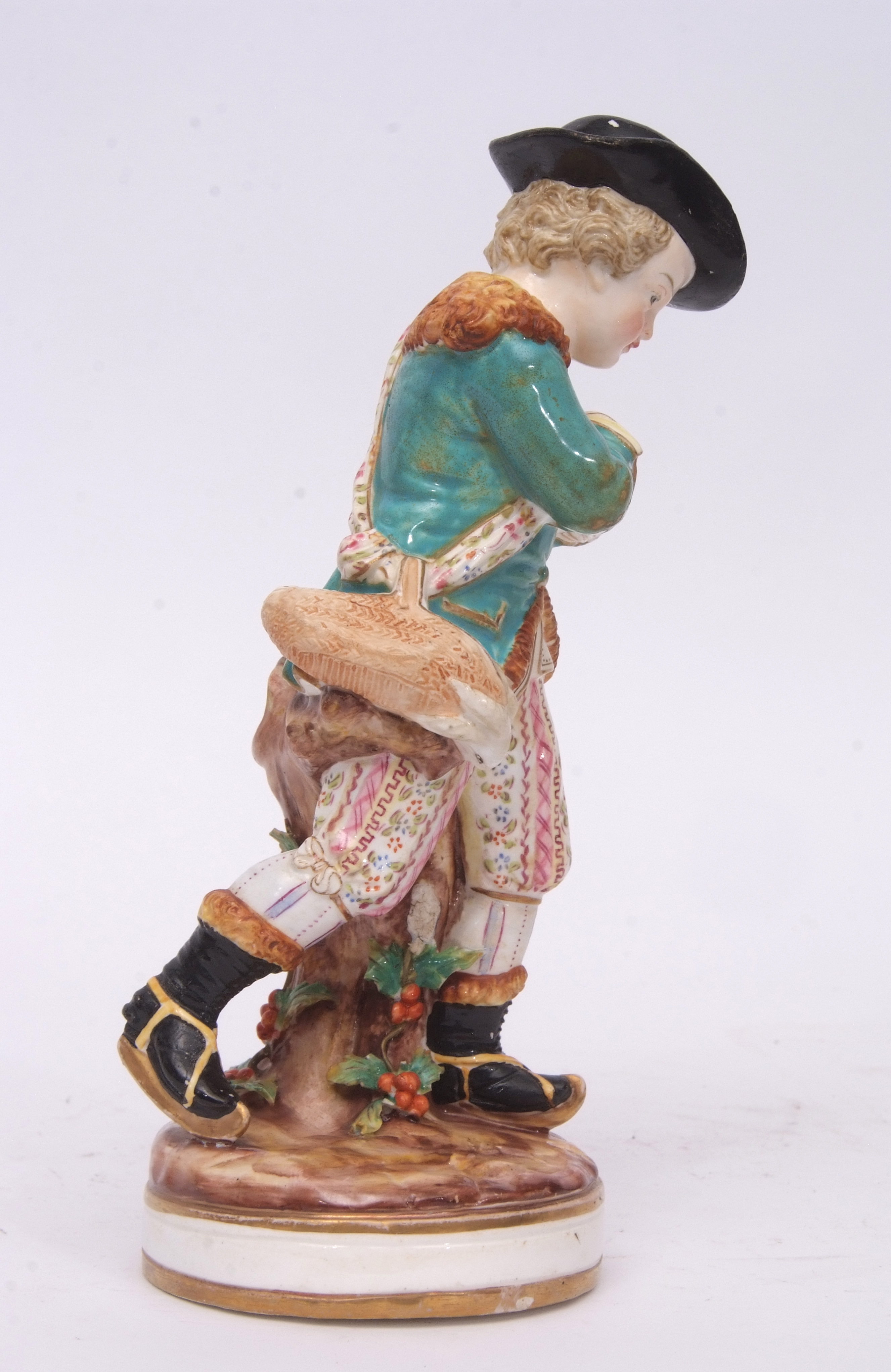 Mid-19th century Derby model of a skater on a circular base with factory mark in red to underside, - Image 2 of 4