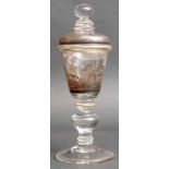 Bohemian Schwarzlot clear glass goblet and cover, the flared goblet painted with hunting scenes, the