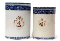 Pair of Chinese porcelain export tankards with interlaced handles decorated with an armorial