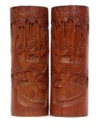 Pair of Chinese bamboo brush pots with typical carving of Chinese figures a various pursuits, 33cm