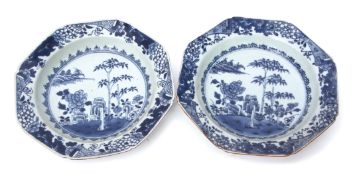 Two 18th century Chinese export octagonal bowls with typical blue and white designs, 21cm diam
