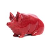 Wemyss flambe model of a pig in typical glazes with factory mark and RH monogram to base, 20cm high