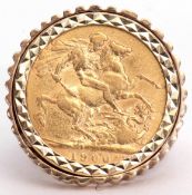 Victorian gold sovereign dated 1900, framed in a 9ct gold textured ring mount, 15.5gms gross weight,