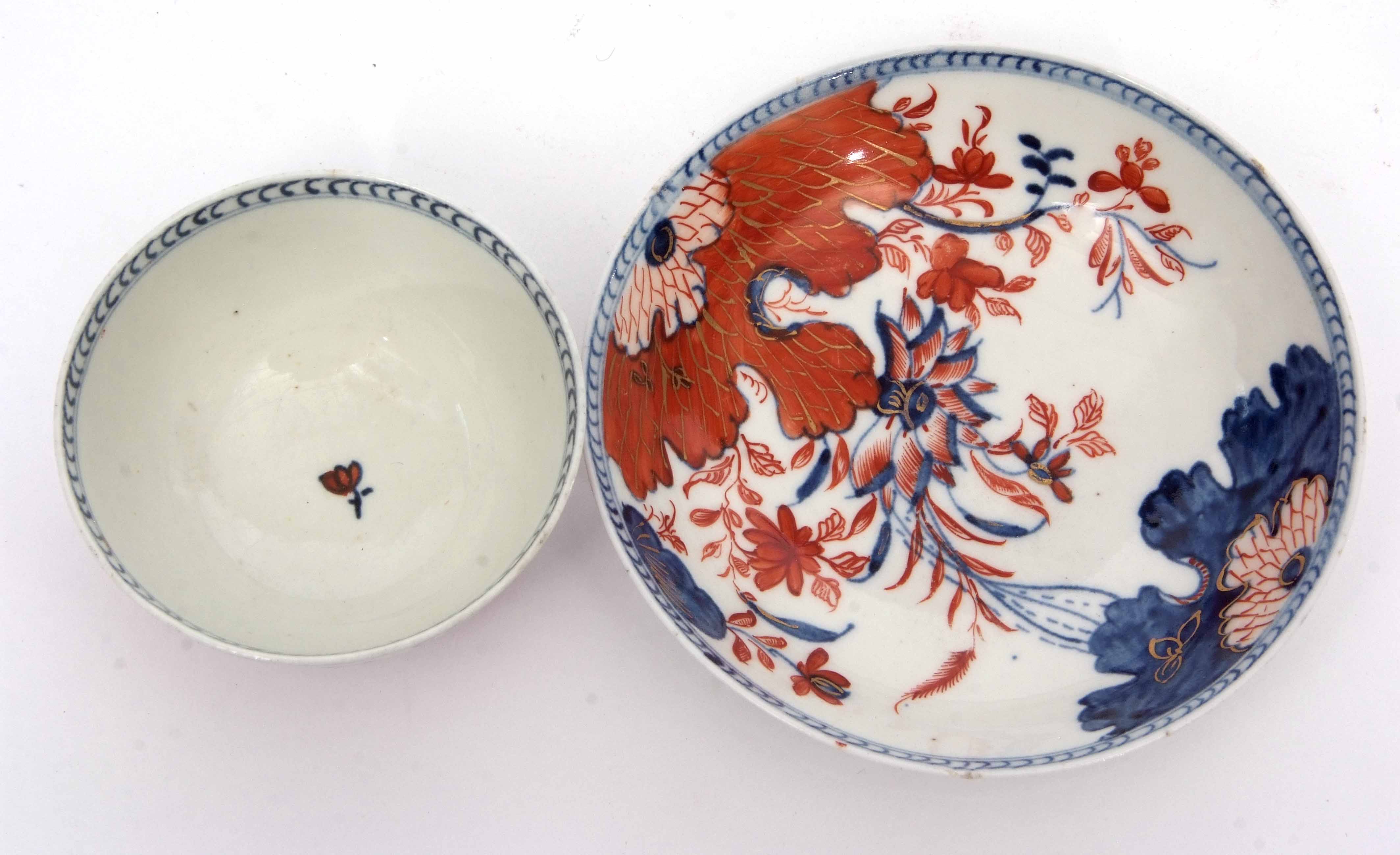 Unusual Lowestoft porcelain tea bowl and saucer with an Imari type tobacco leaf design in iron red - Image 2 of 5