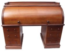 Victorian mahogany large cylinder desk, galleried top over a fitted interior with drawers,