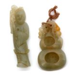 Chinese jade brush washer carved with russet occlusions, together with a jade carving of an