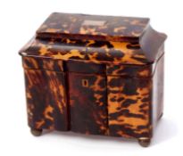Tortoiseshell tea caddy of shaped rectangular form with sarcophagus top with central white metal