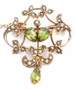 Edwardian peridot and seed pearl brooch, the centre set with two pear shaped peridots surrounded