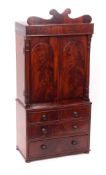 19th century mahogany apprentices linen press/cider cabinet, the fretwork cornice over two arched