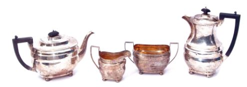 George V four-piece tea set comprising hot water pot, tea pot, sugar basin and milk jug, each of