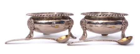 Two William IV cauldron salts, each with applied and wrythen gadrooned rims raised on three cast and