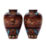 Pair of Japanese cloisonne vases, probably Meiji period, decorated with butterflies and flowering