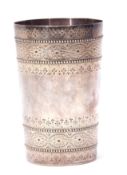 Victorian beaker of tapering cylindrical form with beaded rims and all over engraved decoration with