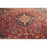 Late 20th century Caucasian large wool carpet, central floral lozenge within a multi-coloured