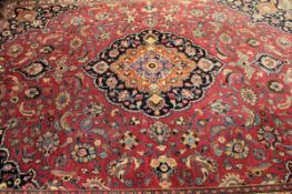 Late 20th century Caucasian large wool carpet, central floral lozenge within a multi-coloured