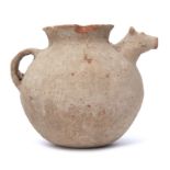 Indus Valley pot, possibly circa 2000BC with a spout modelled as a cow's head, 19cm high