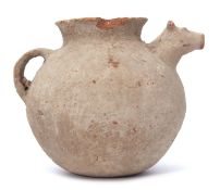 Indus Valley pot, possibly circa 2000BC with a spout modelled as a cow's head, 19cm high