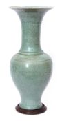 Chinese Longquan celadon vase, possibly Ming dynasty, of elongated pear shaped form with moulded