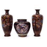 Three pieces of Japanese cloisonne Meiji period comprising two vases of lobed form with enamelled